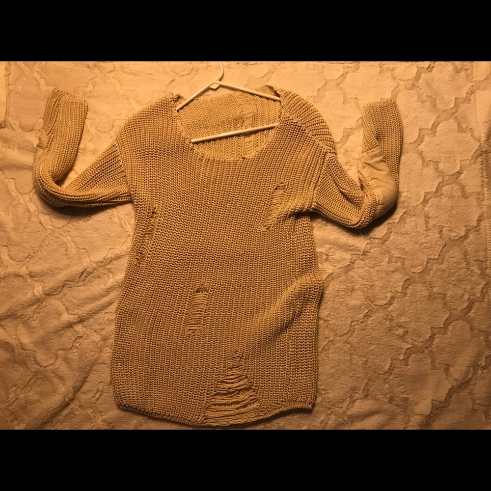 Oversized distressed cream sweater